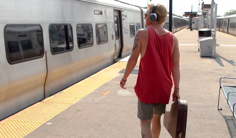 Male at train station wearing SR550